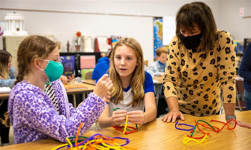 Students make pyramids out of various materials